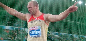 Robert Harting bringt sich in Pose Robert Harting, Europameister, Diskuswerfen, Leichtathletik-EM Helsinki