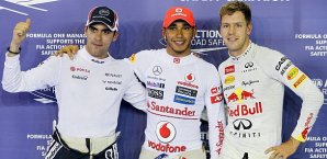 Lewis Hamilton startet in Singapur von der Pole vor Pastor Maldonado (l.) und Sebastian Vettel (r.) Pastor Maldonado, Lewis Hamilton, Sebastian Vettel