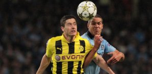 Robert Lewandowski (l.) im Zweikampf mit Jack Rodwell Jack Rodwell, Manchester City, Borussia Dortmund, Robert Lewandowski