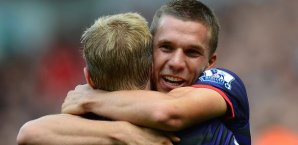 Lukas Podolski jubelt mit Per Mertesacker lukas podolski, per mertesacker, fc arsenal