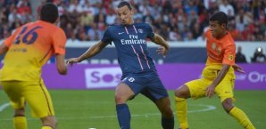 Rafinha Alcantara im Zweikampf mit Zlatan Ibrahimovic Rafinha Alcantara,Zlatan Ibrahimovic,FC Barcelona,PSG