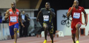 Asafa Powell (r.) wurde für 18 Monate gesperrt Asafa Powell