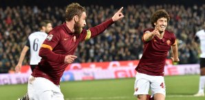 Daniele De Rossi (l.) erzielte den Siegtreffer für die Roma Daniele De Rossi
