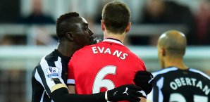 Papiss Demba Cisse, Johnny Evans