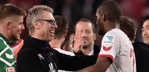 Stöger (l.) und Stürmer Modeste könnten Köln Richtung Europa führen Anthony Modeste