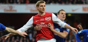 Per mertesacker, phil jagielka, arsenal, everton