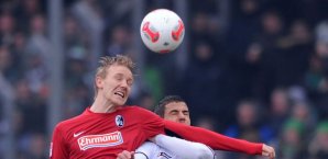 Jan Rosenthal im Duell mit Soto Han Rosenthal,Alvaro Dominguez Soto,SC Freiburg,Borussia Mönchengladbach