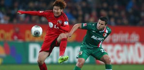 Heung Min Son (l.) im Zweikampf mit Raul Bobadilla Bayer Leverkusen